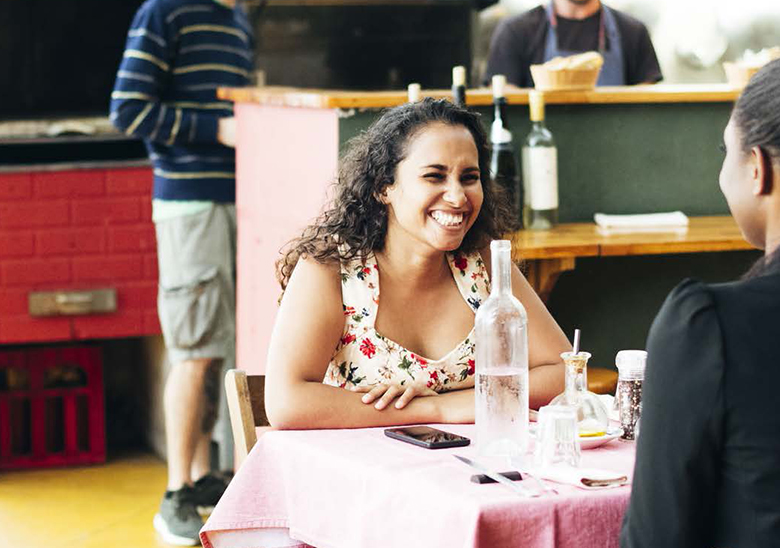 woman eating at a table