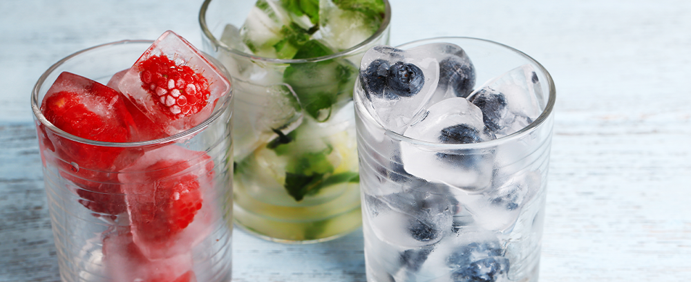 glasses with fruits and ice