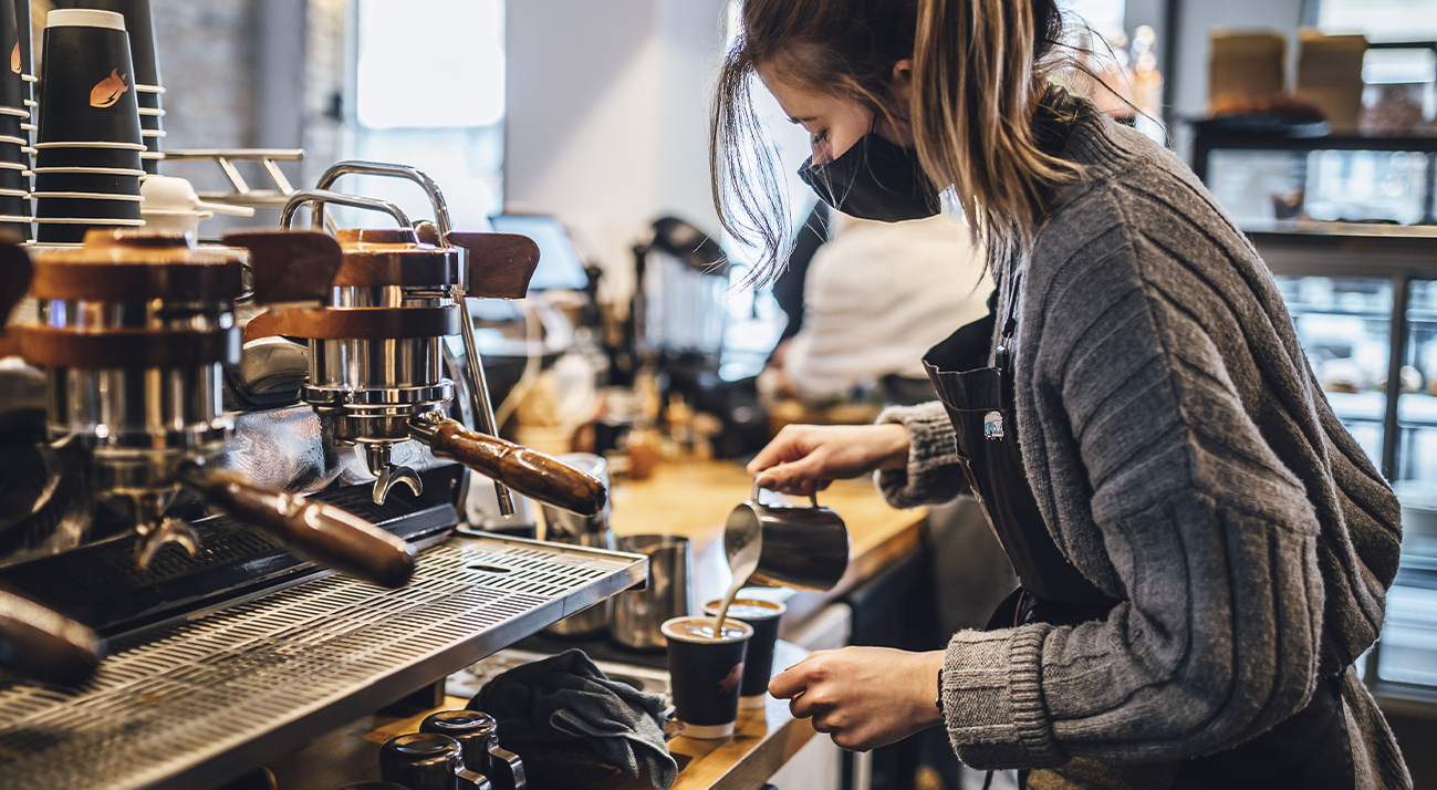 barista serving coffee