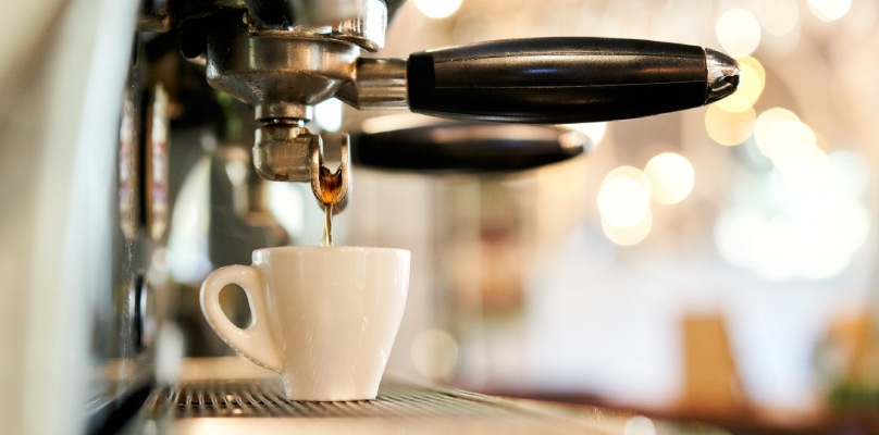 coffee dripping into a cup