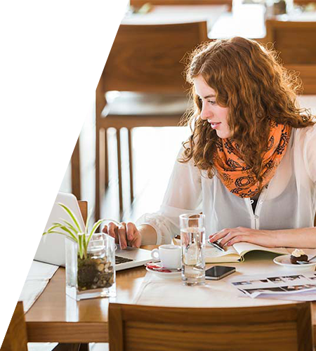 woman studying while drinking coffee